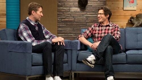 Andy Samberg Wears a Plaid Shirt and Glasses